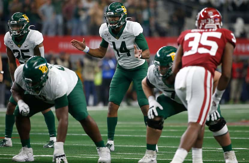 ARLINGTON, TX - DECEMBER 07: Jacob Zeno #14 of the Baylor Bears waits for the snap against...