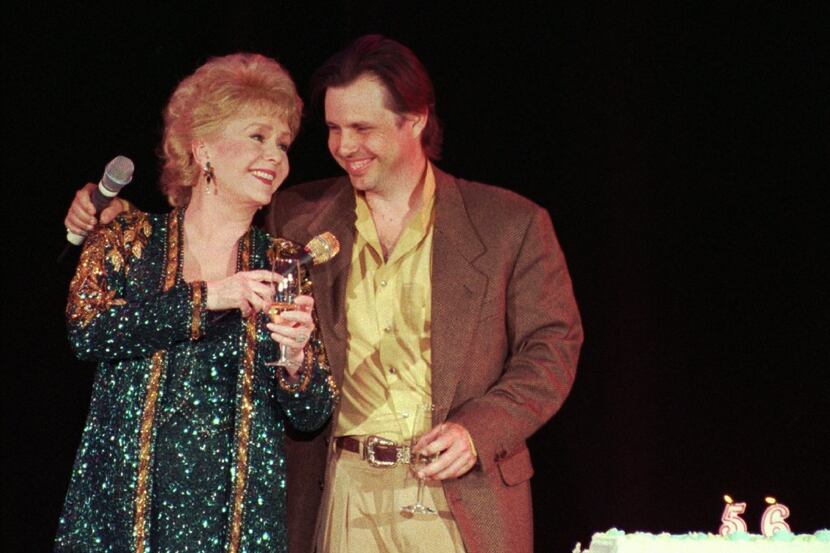 In this April 1, 1997, file photo, Debbie Reynolds, left, celebrates her 65th birthday on...