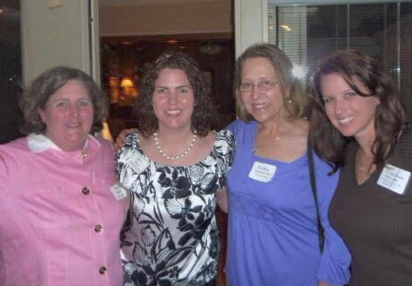 
Adoptee Jolie Poirot (second from left) of Plano poses with her birth mother Patricia...