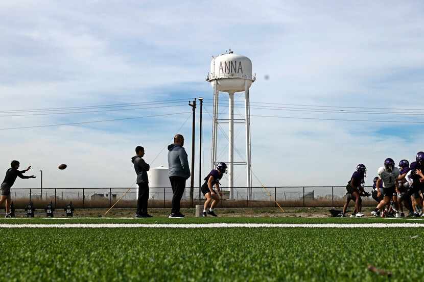 Anna High School football players are seen during their practice in the school’s field,...