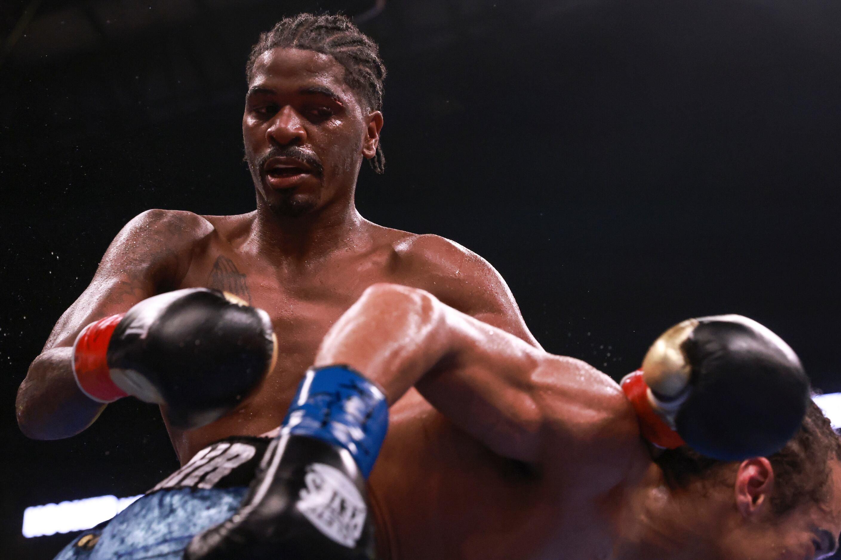 Maurice Hooker throws a punch as Blair Cobbs ducks, Saturday, August 6, 2022, at Dickies...