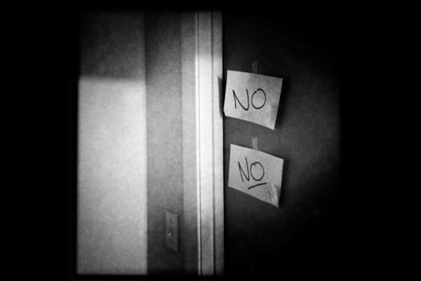 Do not enter warnings hang on a door to a darkroom.