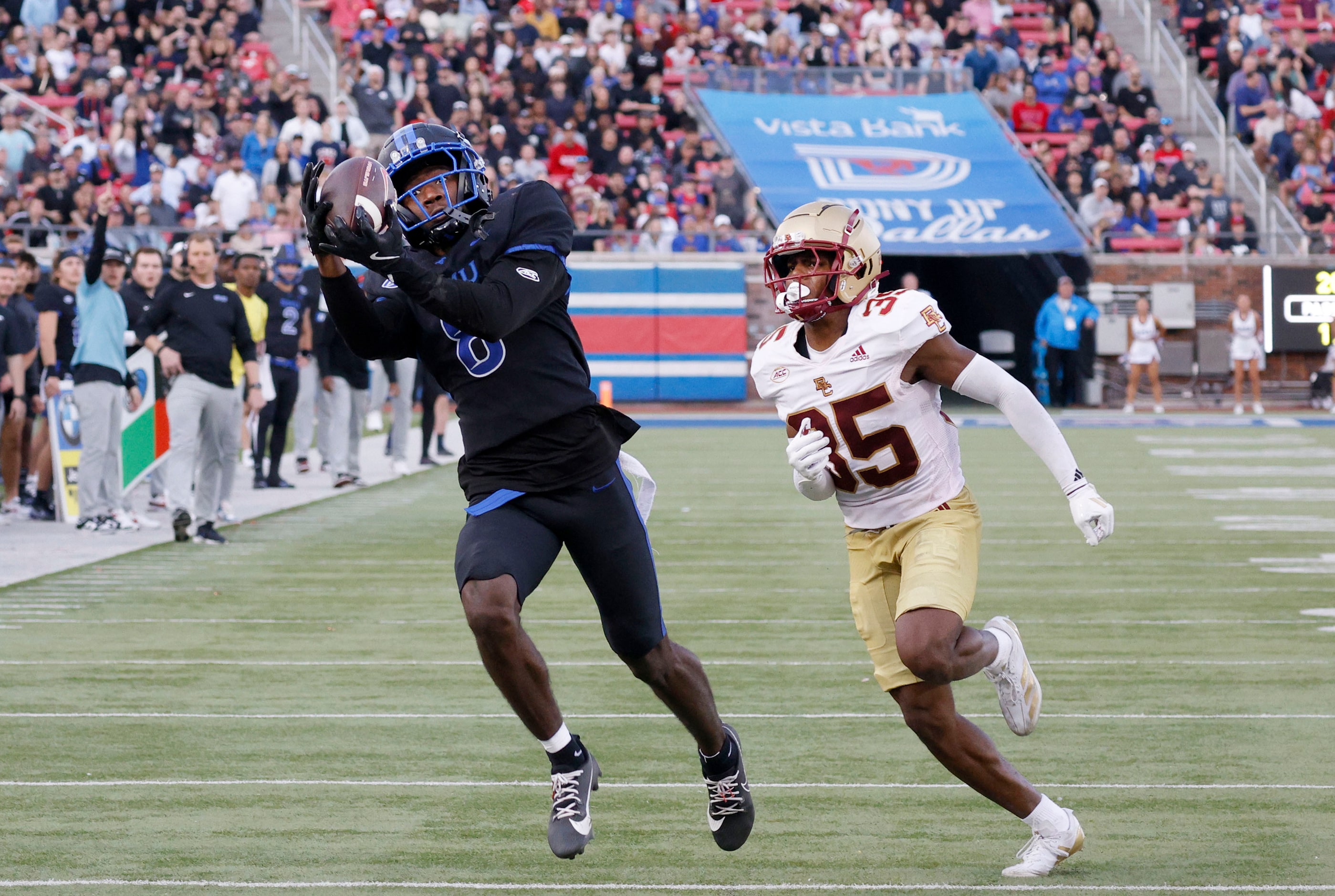 SMU wide receiver Jordan Hudson (8) receives a touchdown pass against Boston College...