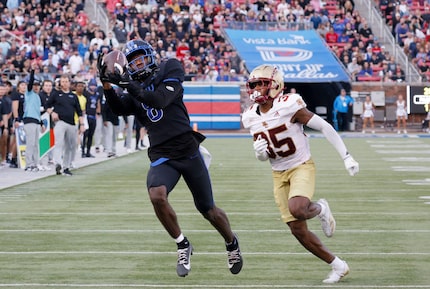 SMU wide receiver Jordan Hudson (8) receives a touchdown pass against Boston College...