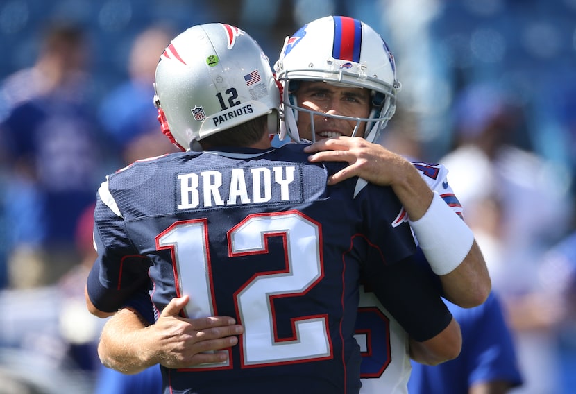 Tom Brady  hugs Buffalo's Matt Cassel before a Patriots-Bills game. (Photo by Tom...