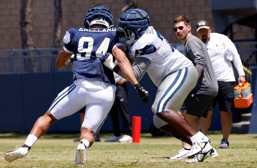 Dallas Cowboys offensive tackle Asim Richards (76) blocks defensive end Marshawn Kneeland...