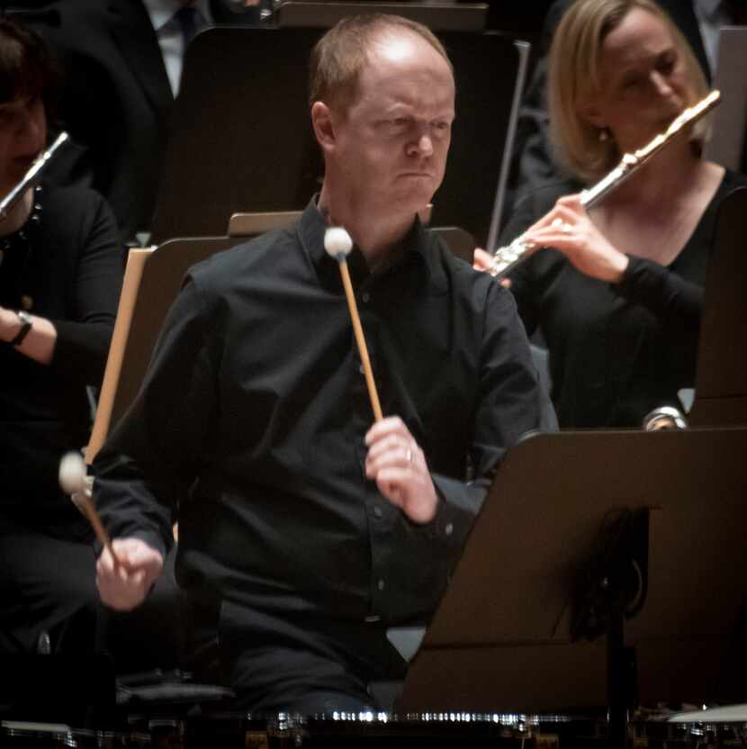 Dallas Symphony Orchestra principal timpanist Brian Jones performs the world premiere of...