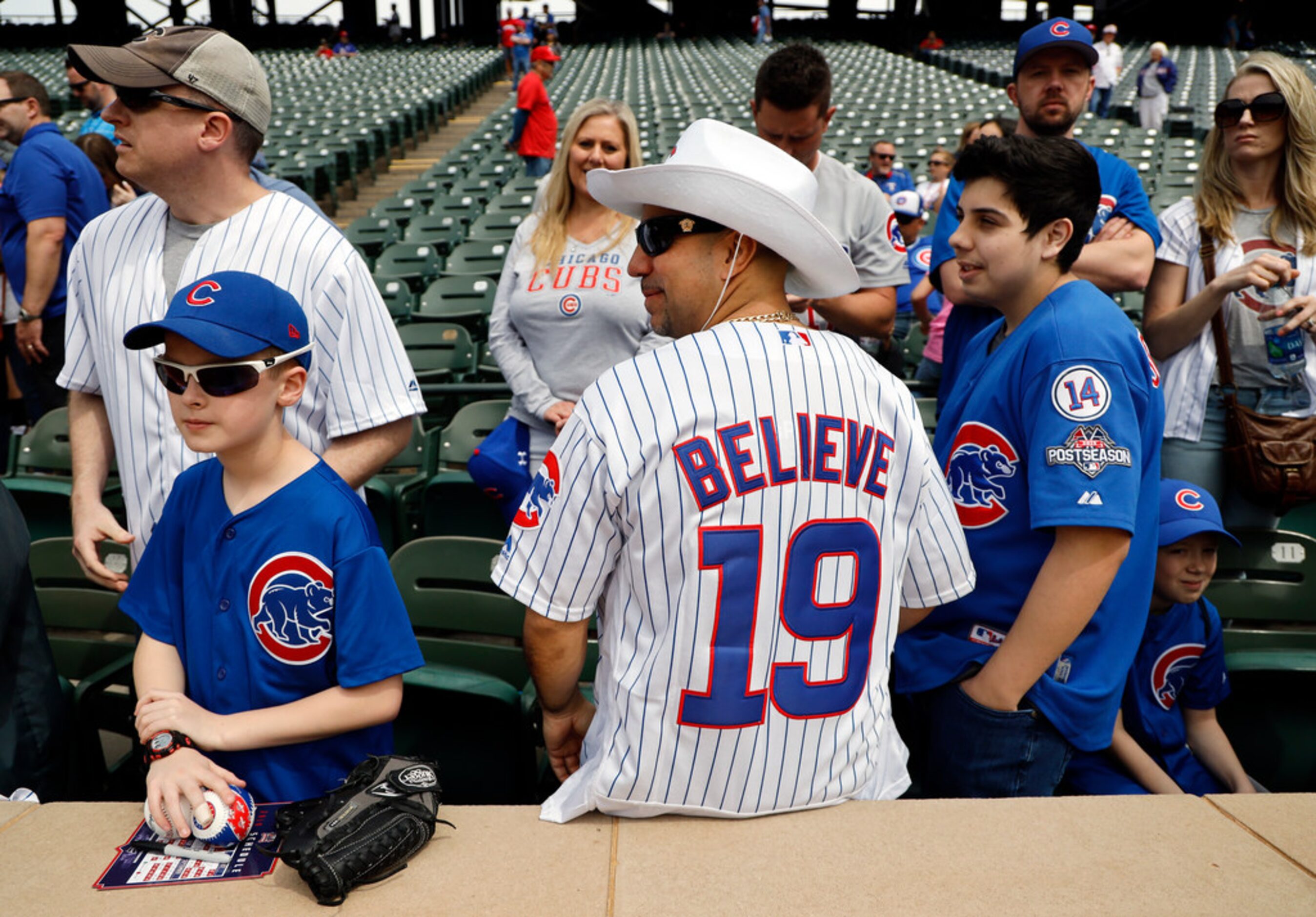 Chicago Cubs fan Richie Gracia of Chicago, Illinois wore his Believe jersey to Opening Day...