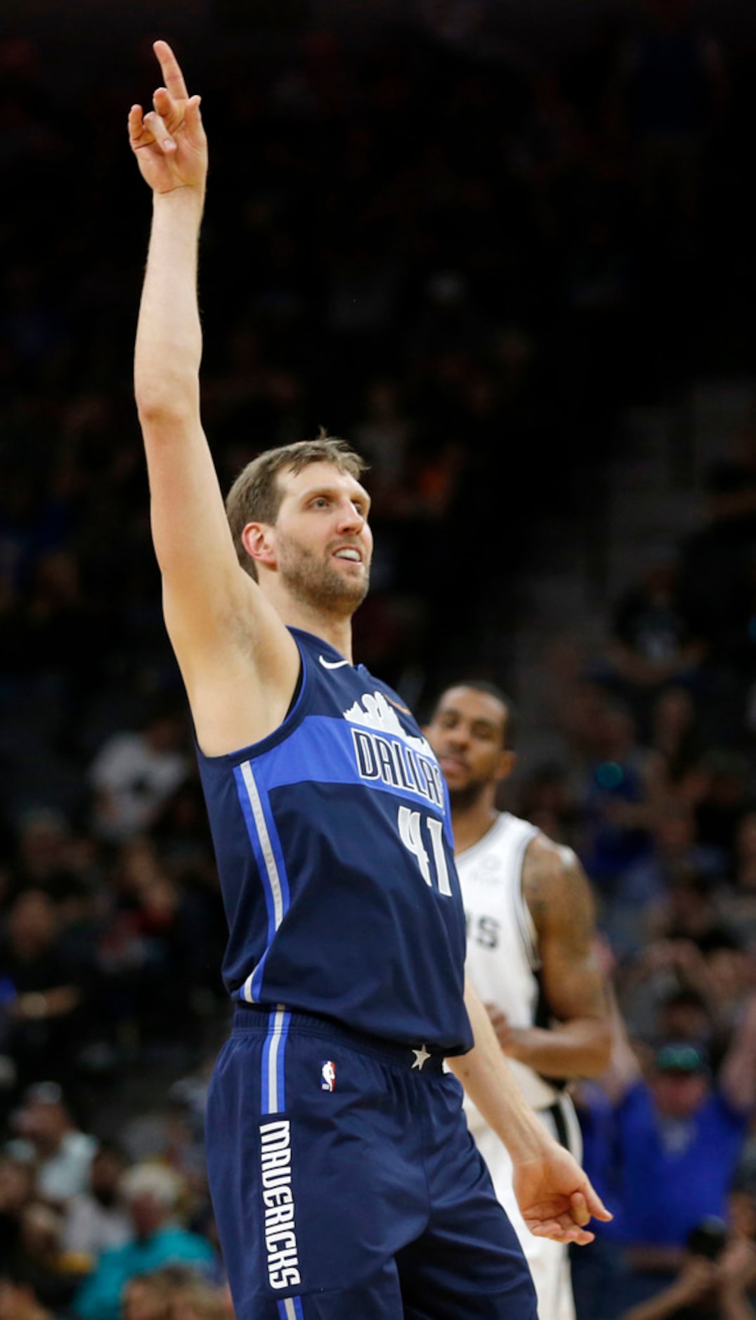 Dallas Mavericks forward Dirk Nowitzki (41) reacts after a shot during the second half of...