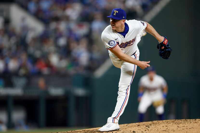 Texas Rangers relief pitcher Josh Sborz (66) delivers during the sixth inning against the...