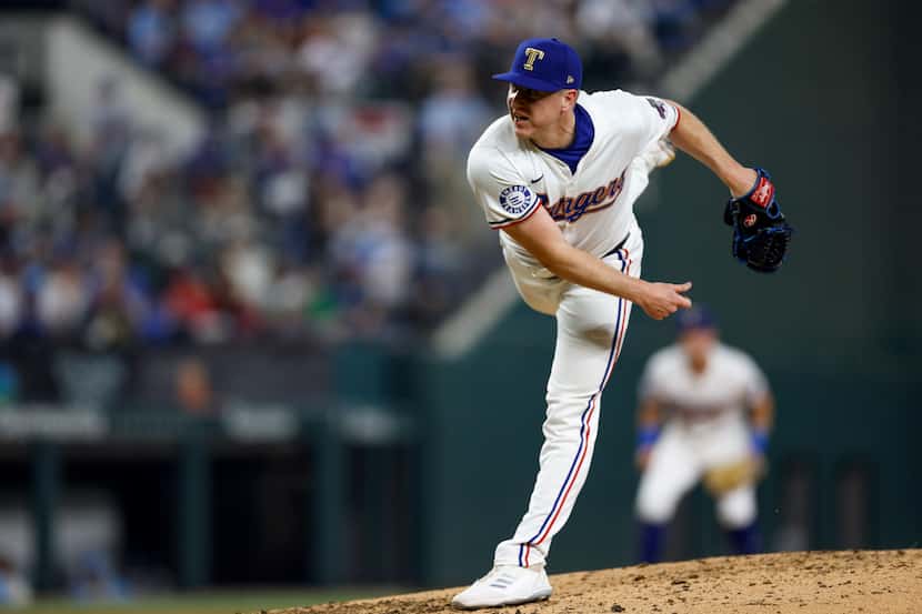 Texas Rangers relief pitcher Josh Sborz (66) delivers during the sixth inning against the...