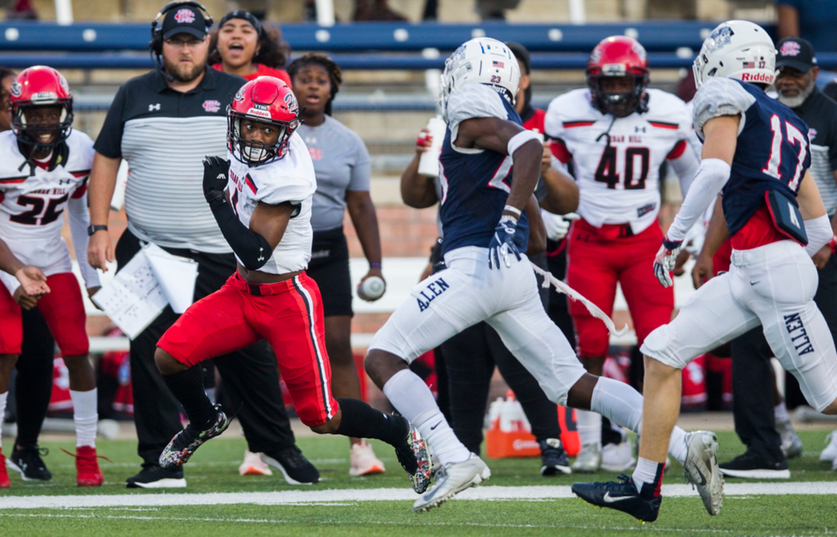 Cedar Hill wide receiver Quin Bright (1) runs the ball during the first quarter of a high...