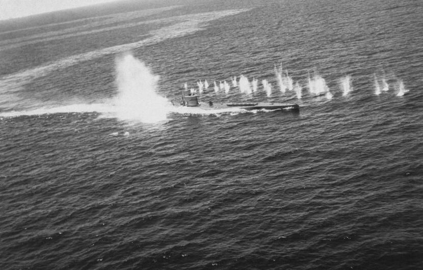 A German U-boat attempted to escape attack from planes from the aircraft carrier USS Bogue...