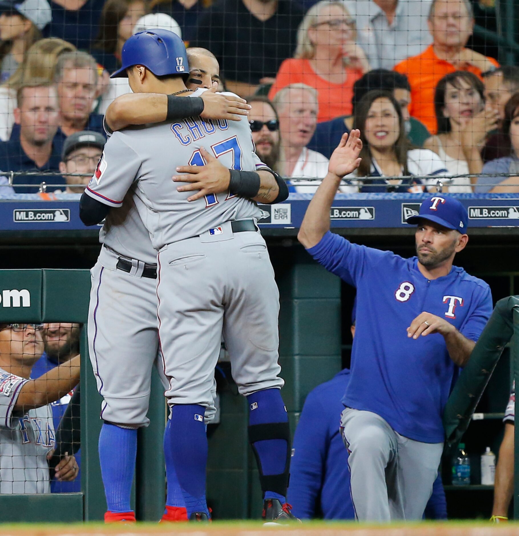 HOUSTON, TEXAS - JULY 20: Shin-Soo Choo #17 of the Texas Rangers is congratulated by Rougned...