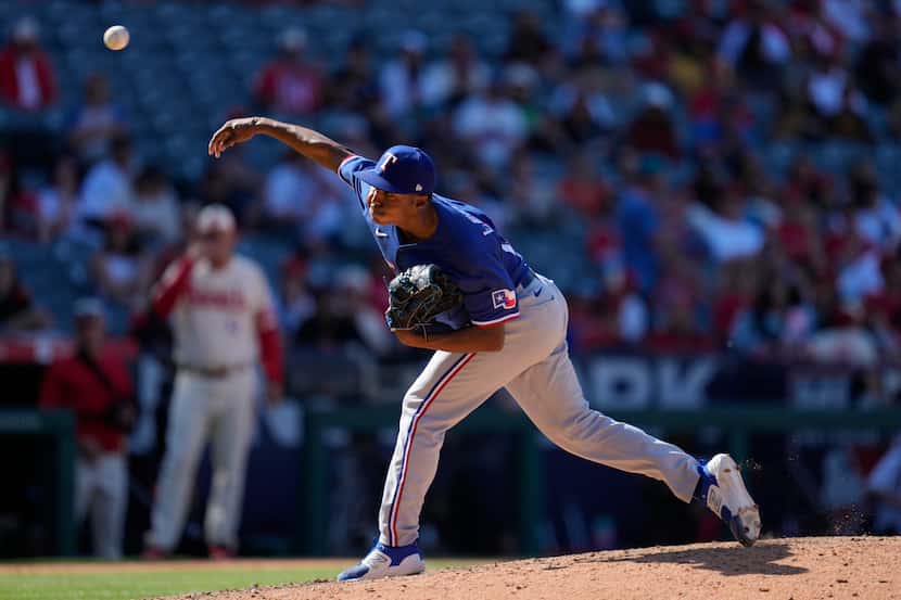 Texas Rangers relief pitcher Jose Leclerc (25) throws during the ninth inning of a baseball...
