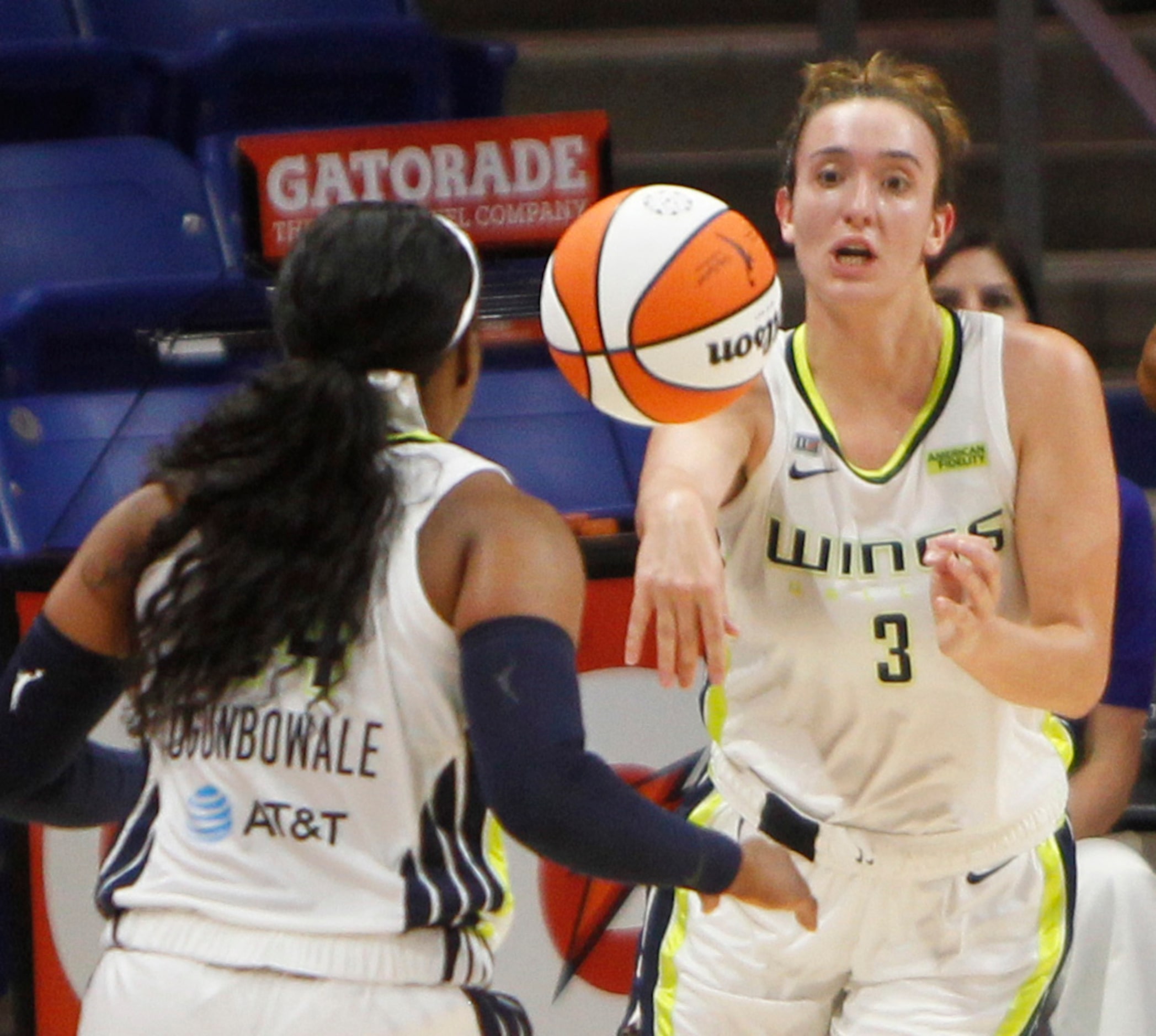 Dallas guard Marina Mabrey (3) gets off an outlet pass to guard Arike Ogunbowale (24) during...