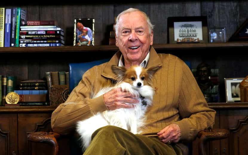 T. Boone Pickens, in his office with his dog, Murdock, has made it his mission to help break...