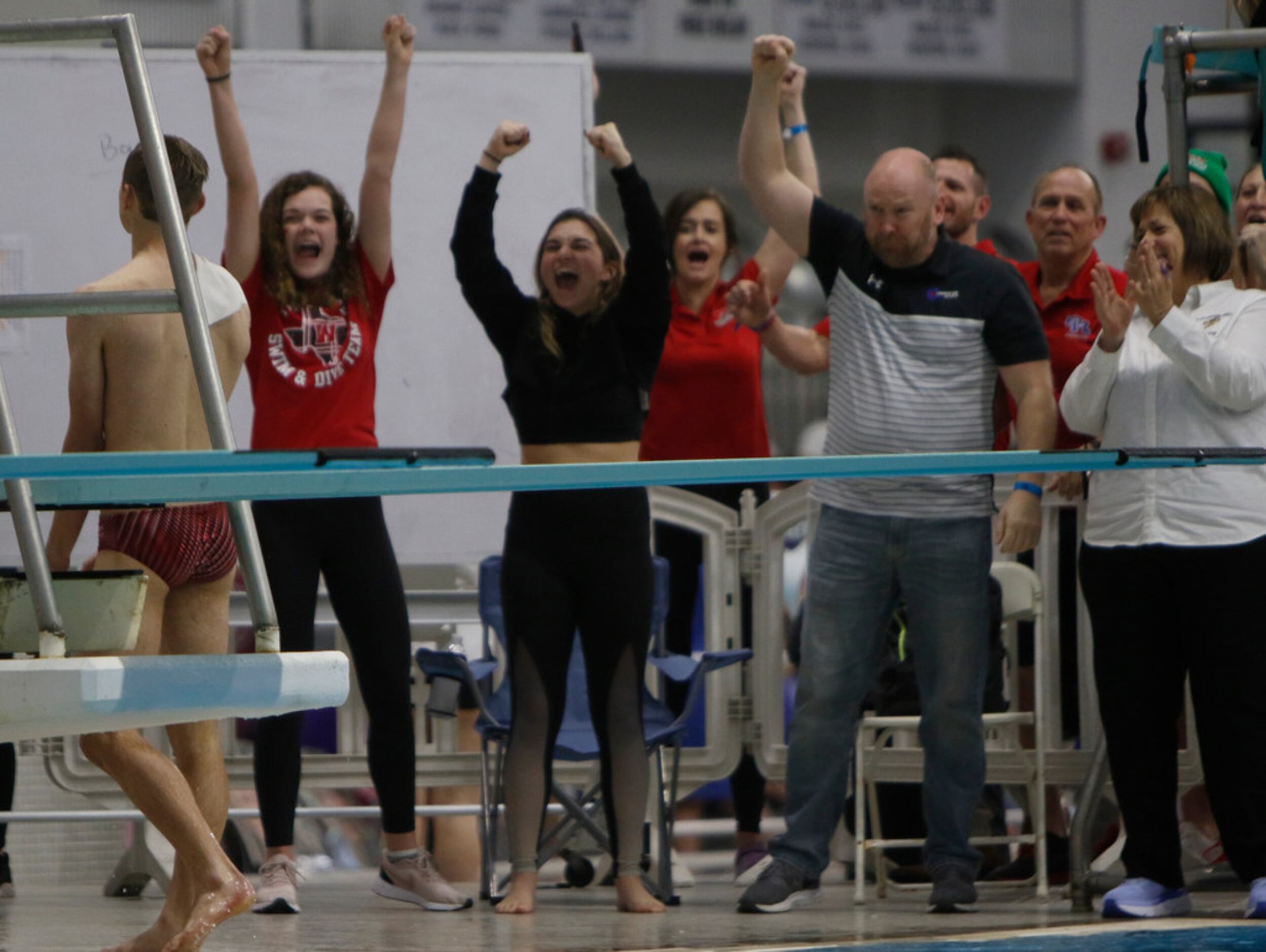 Cameron Cash emerges from the pool to a loud show of support after the athlete from Conroe...