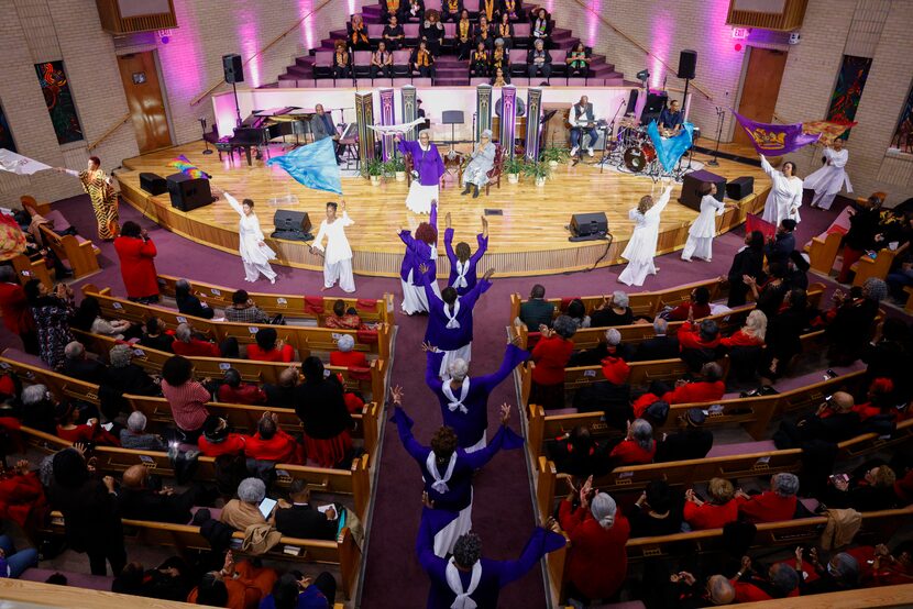 Dancers performs as Opal Lee (seated on stage) watches during a special Sunday service...