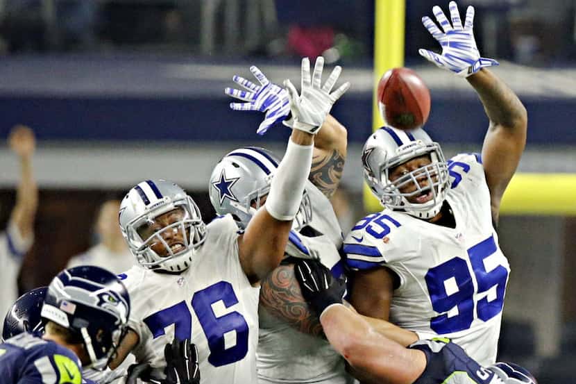Dallas Cowboys defensive tackle David Irving (95) blocks a field goal attempt Seattle...