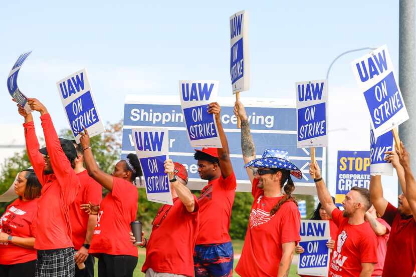 UAW members cheer as employees walkout from the Fort Worth Parts Distribution Cente on...