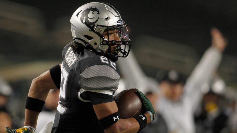 Denton Guyer defensive back Peyton Bowen (22) returned a second quarter interception against...