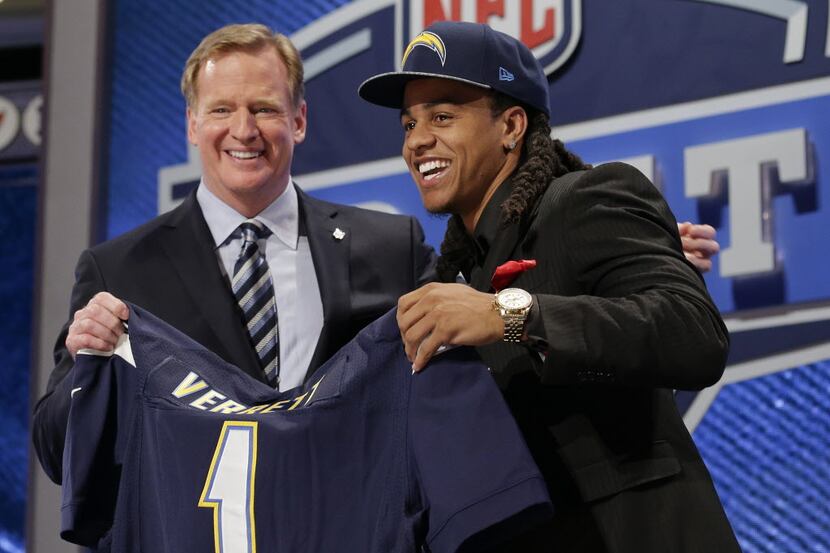 Texas Christian cornerback Jason Verrett reacts with NFL commissioner Roger Goodell after...