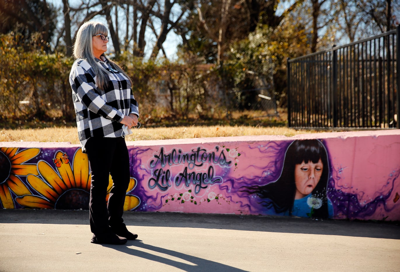 Amber Hagerman's mother Donna Williams waits her turn to speak during a press conference at...