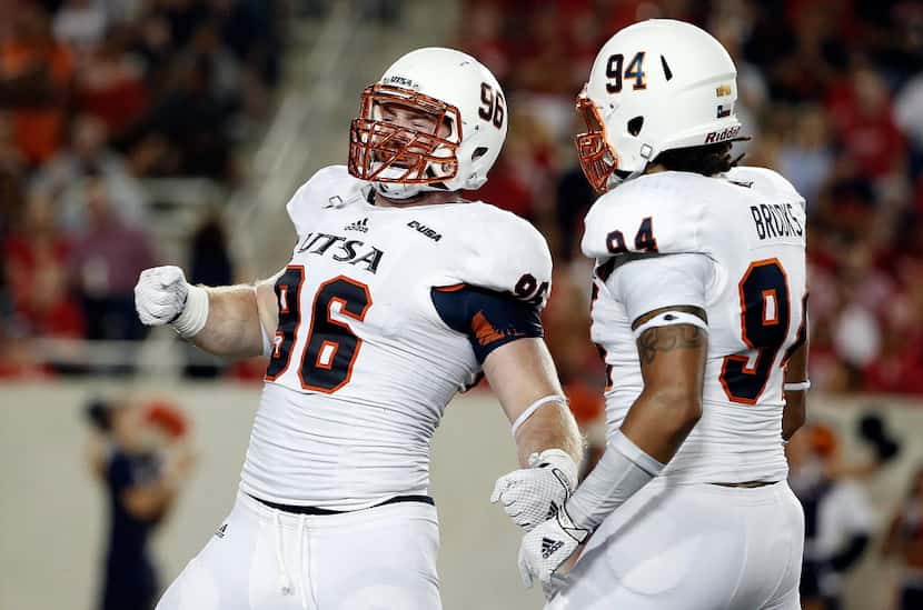 HOUSTON, TX - AUGUST 29:  Jason Neill #96 of the UTSA Roadrunners reacts to a sack against...