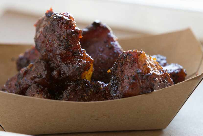 These beauties are bacon burnt ends, one of the most popular items at Heim Barbecue. A...