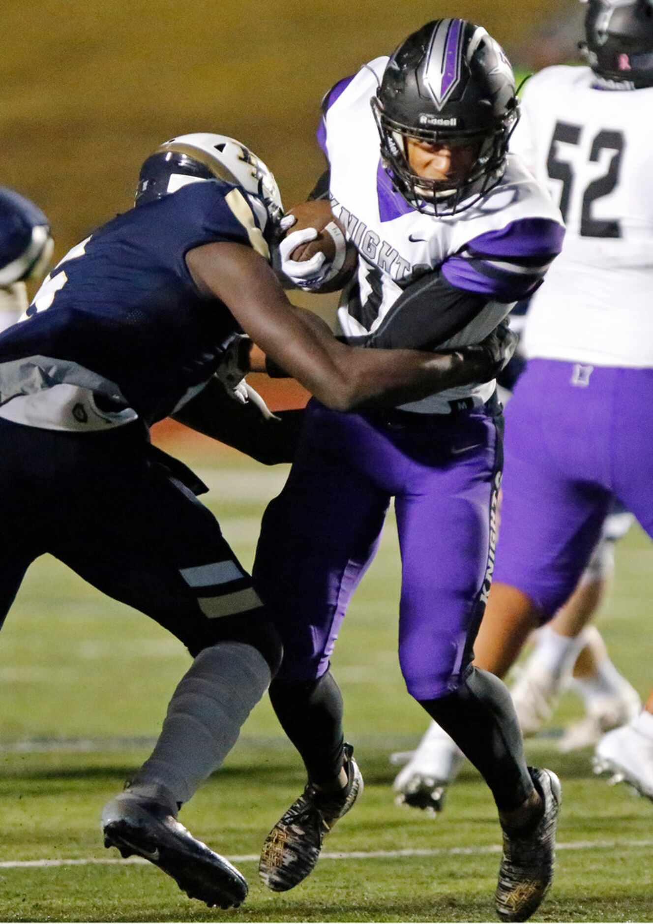 Independence High School Reggie Bush (31) is met by Little Elm High School safety Ryan Watts...