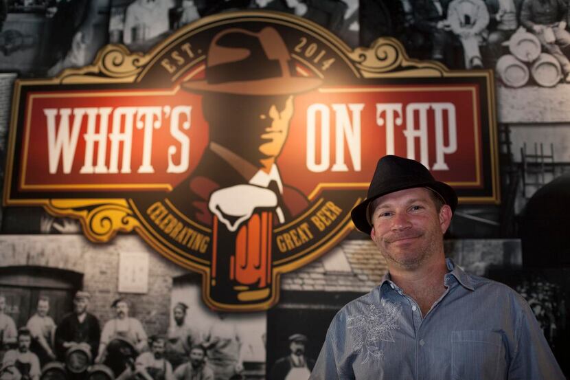 
Brad Trapnell, owner of What’s on Tap, poses at the “beer cafe” on Friday in Highland...