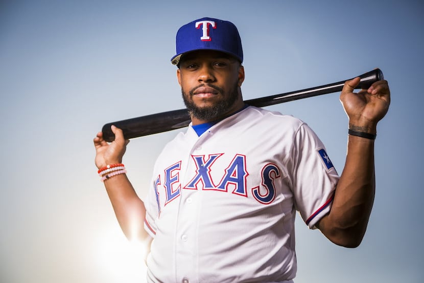 Texas Rangers outfielder Delino DeShields photographed during spring training photo day at...
