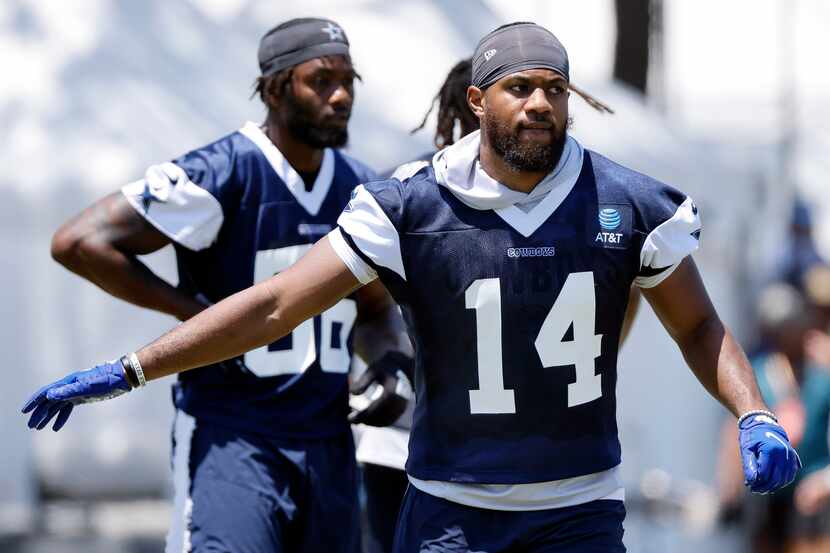 Dallas Cowboys linebacker Jabril Cox (14) moves into position for a walk-thru play during a...