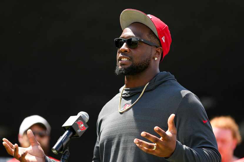 FILE - In this Sept. 18, 2018, gilr photo, Tampa Bay Buccaneers' Gerald McCoy speaks during...