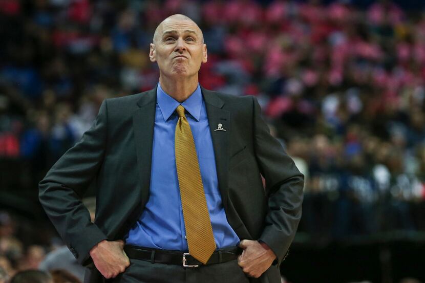 Dallas Mavericks head coach Rick Carlisle looks to the scoreboard during the first half a...