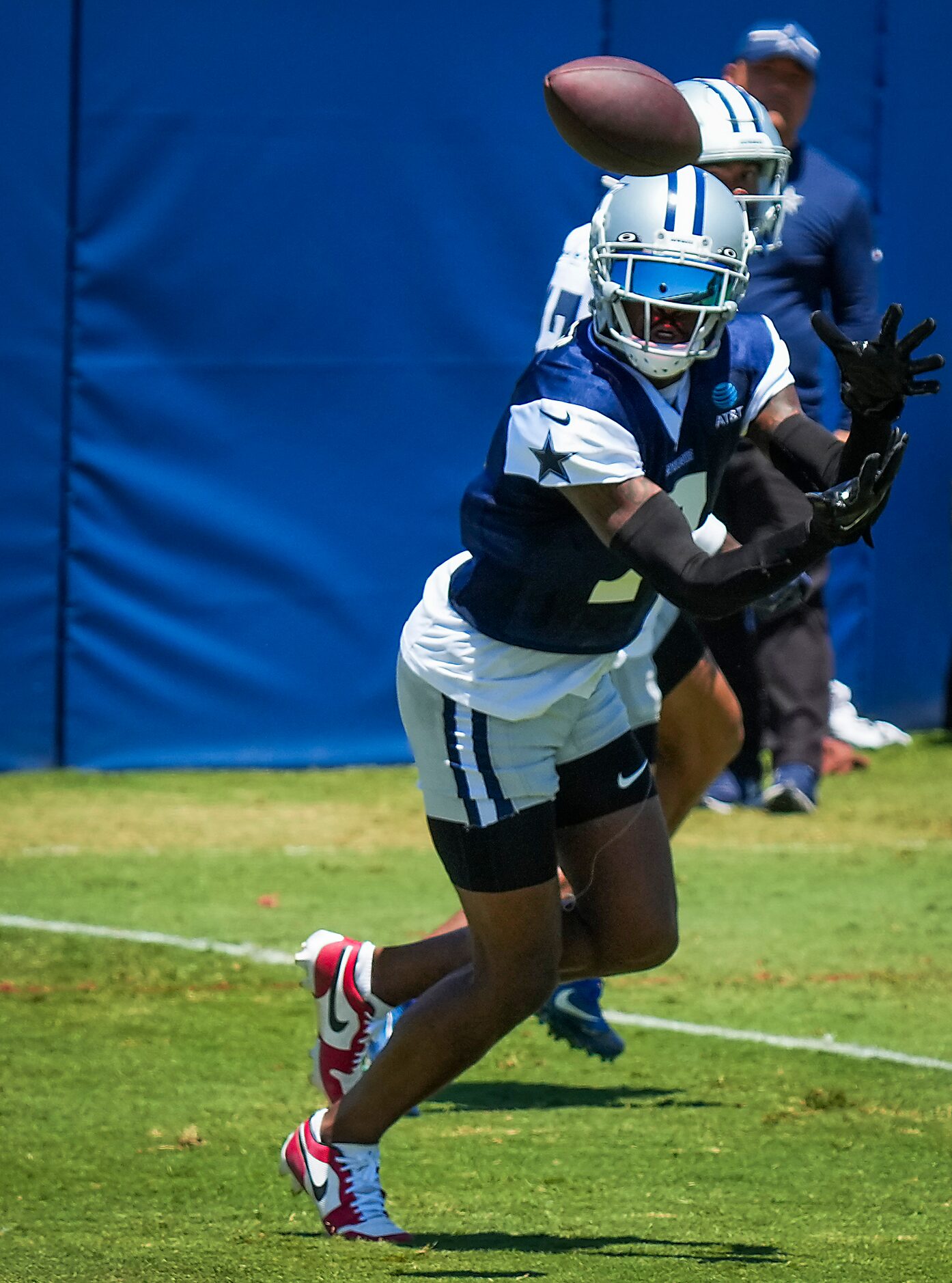 Dallas Cowboys cornerback Trevon Diggs (7) intercepts a pass during a training camp practice...