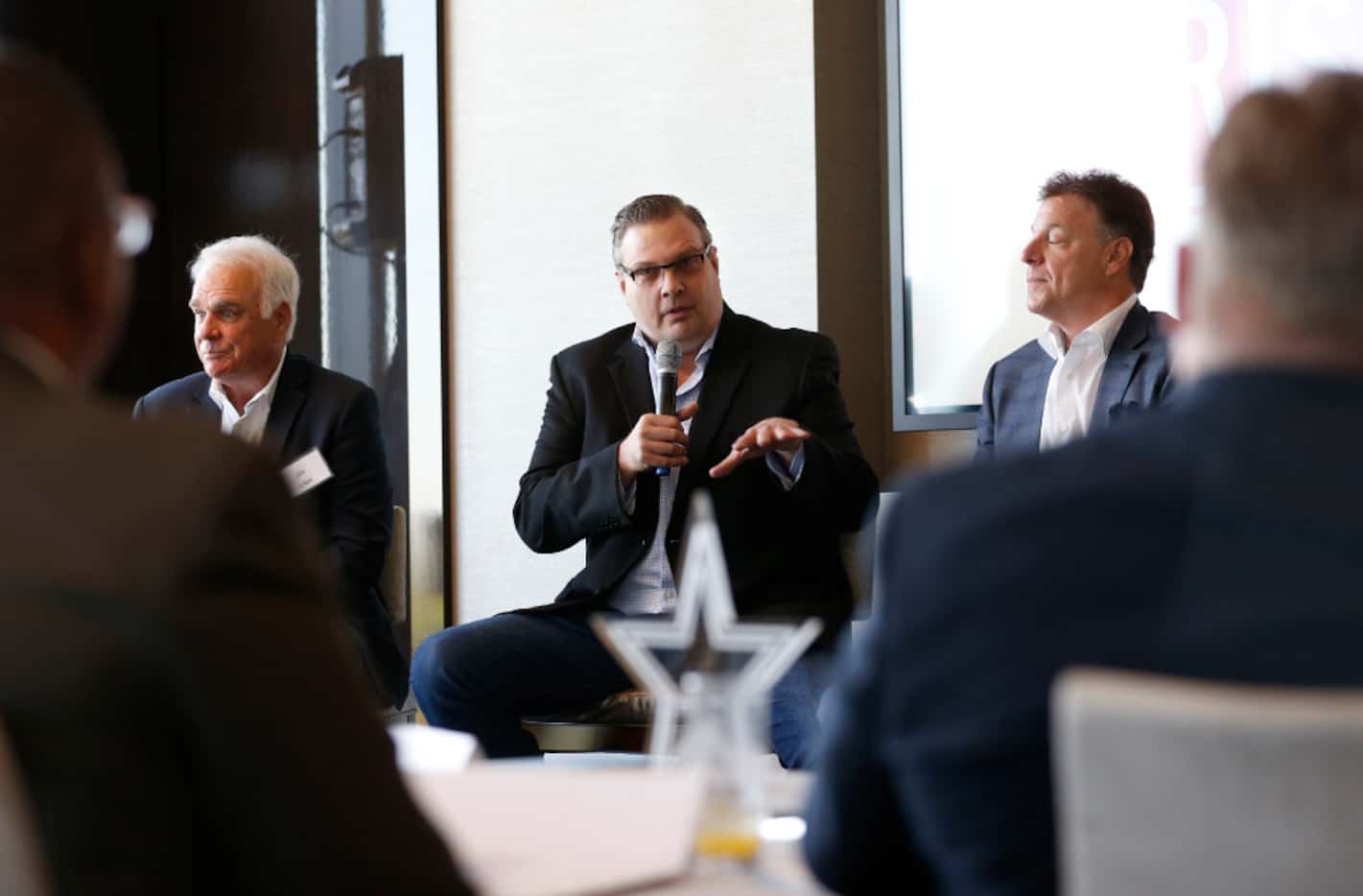 Texas Legends President Donnie Nelson (center) speaks during a panel that included Dallas...
