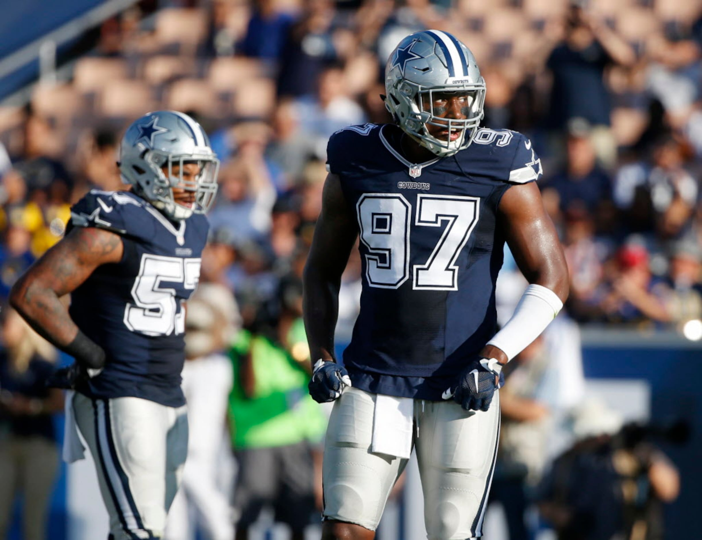 November 05, 2018:.Dallas Cowboys defensive end Taco Charlton (97)  celebrates as the defense forces a turnover.during an NFL football game  between the Tennessee Titans and Dallas Cowboys at AT&T Stadium in  Arlington