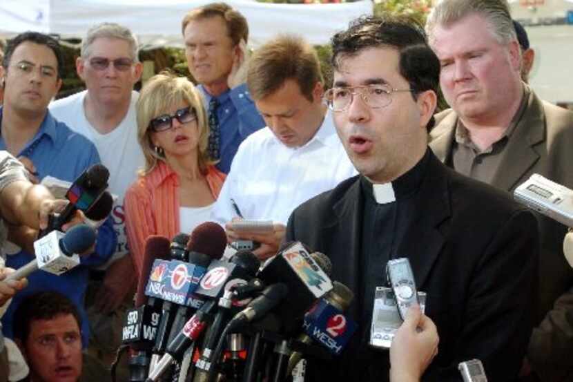 Rev. Frank Pavone speaks to reporters shortly after it was annouced Terri Schiavo had died,...