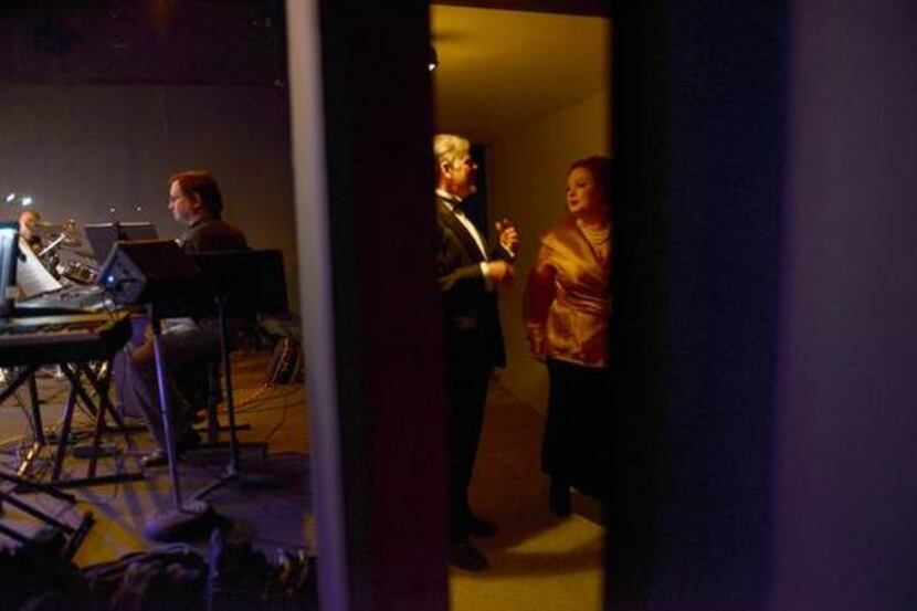 Director Shane Hurst (left) plays the piano while actors Andrew Burns and Kimberly Smith...