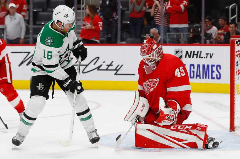 Detroit Red Wings goaltender Jonathan Bernier (45) stops a shot by Dallas Stars center Joe...