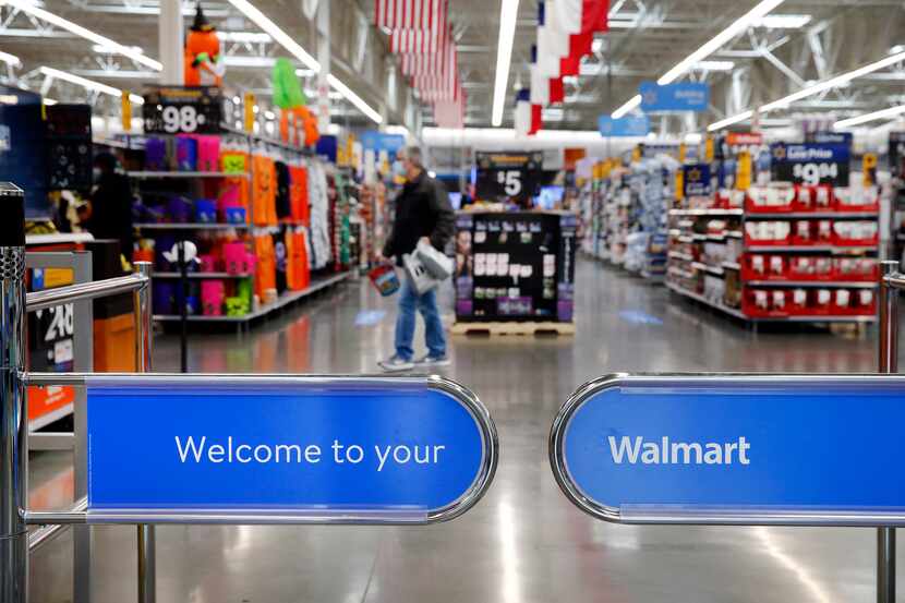 A gate welcomes shoppers to the Walmart Supercenter on Lyndon B. Johnson Freeway in Dallas.