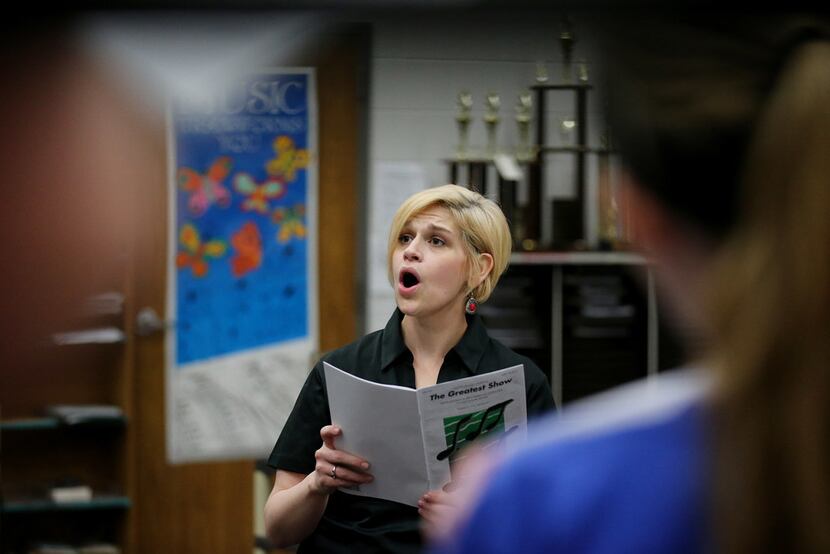 Choir teacher Allison Hartzell rehearses a song at Coppell Middle School West. Hartzell has...