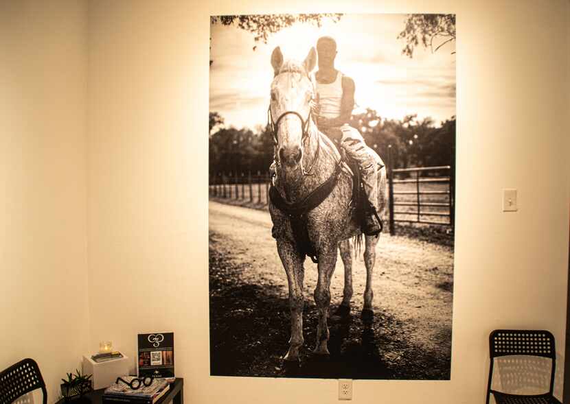 An image of a Black cowboy on a horse, the photo was taken by Tramaine Townsend.
