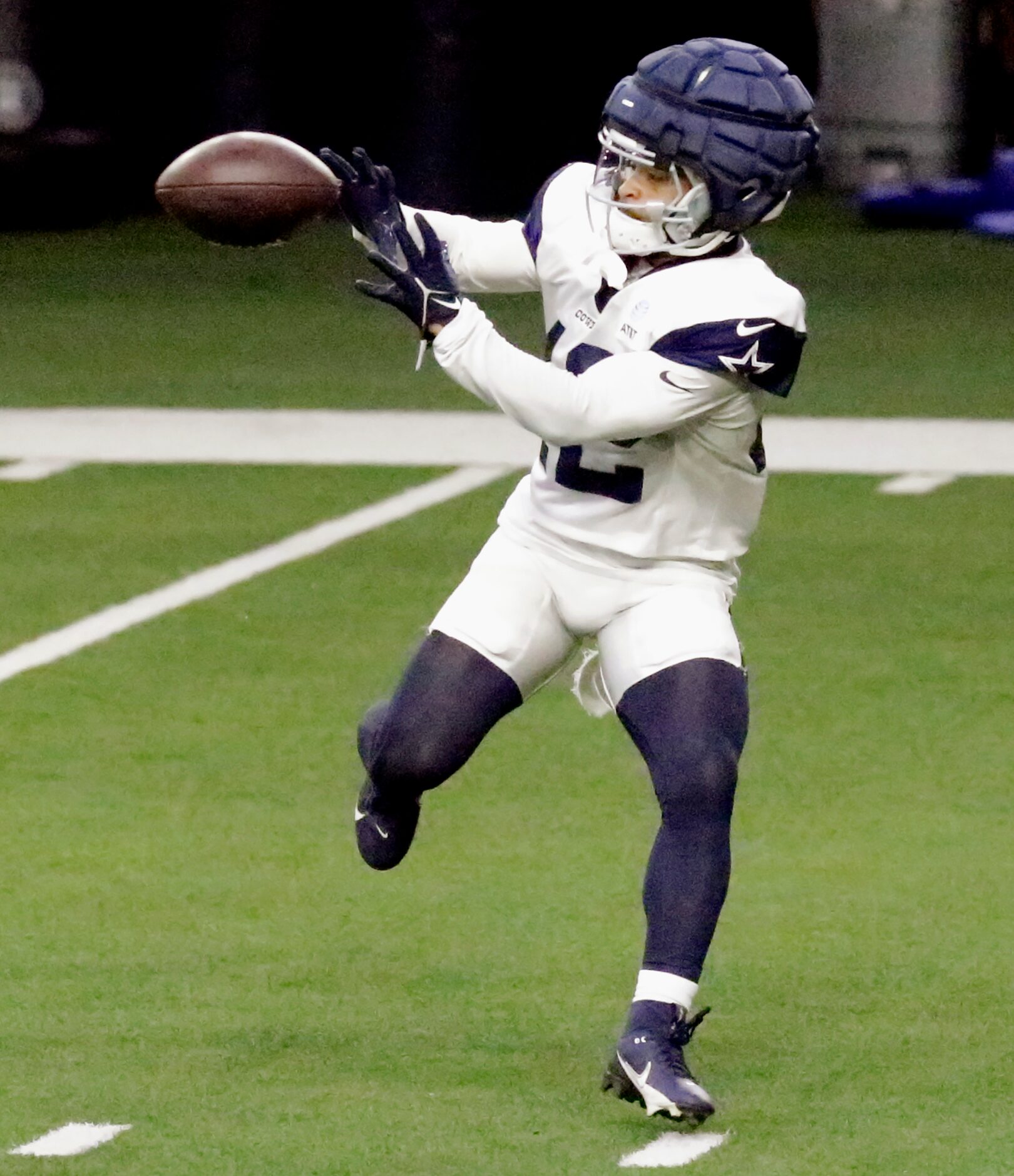 Dallas Cowboys running back Deuce Vaughn (42) catches a pass as the Dallas Cowboys held...