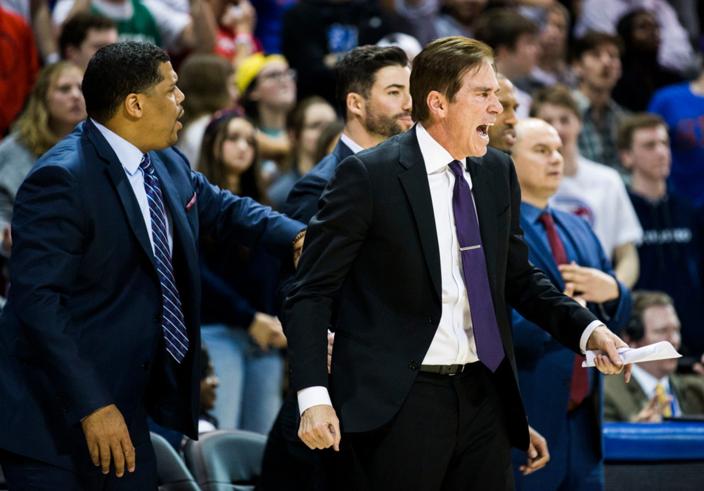 Southern Methodist Mustangs head coach Tim Jankovich (right) yells from the sideline during...