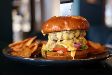 You've got to have a cheeseburger on most restaurant menus in Dallas. Here's the burger from...
