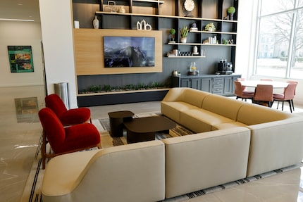 A seating area in the lobby of Apex at Legacy