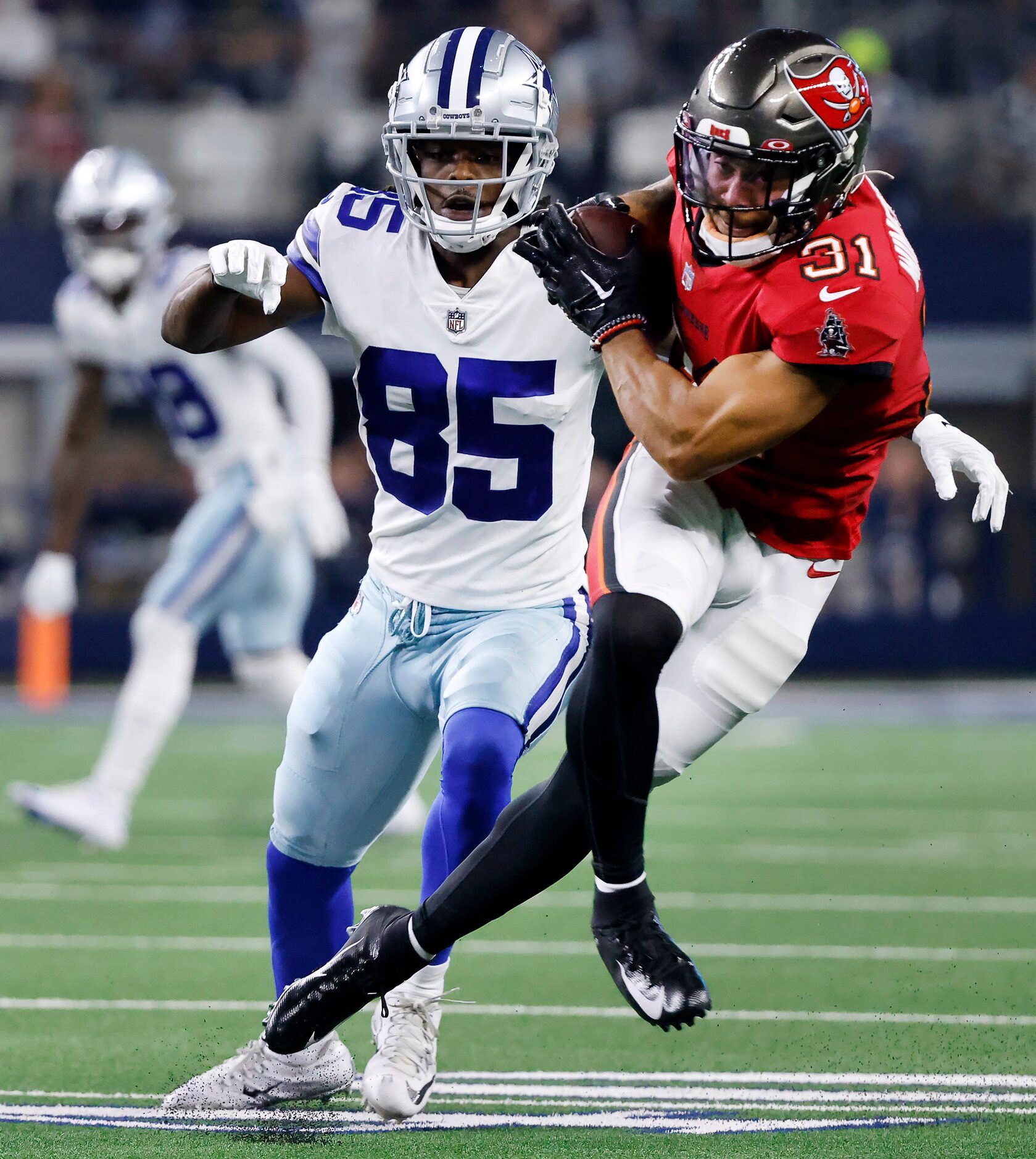 Tampa Bay Buccaneers safety Antoine Winfield Jr. (31) intercepts a Dak Prescott pass as...